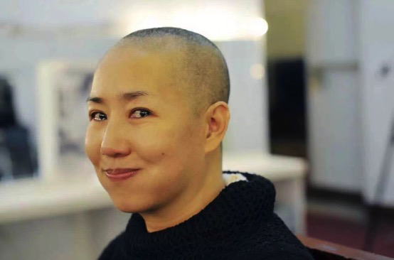 剃发后的谢涛